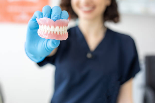 Full Arch Dental Implants vs Dentures
